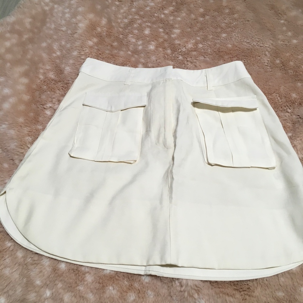 Cream Mini Skirt with Pocket Flaps